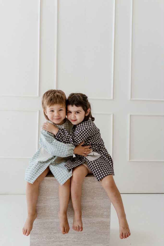 Bata escolar con botones Vichy Aqua